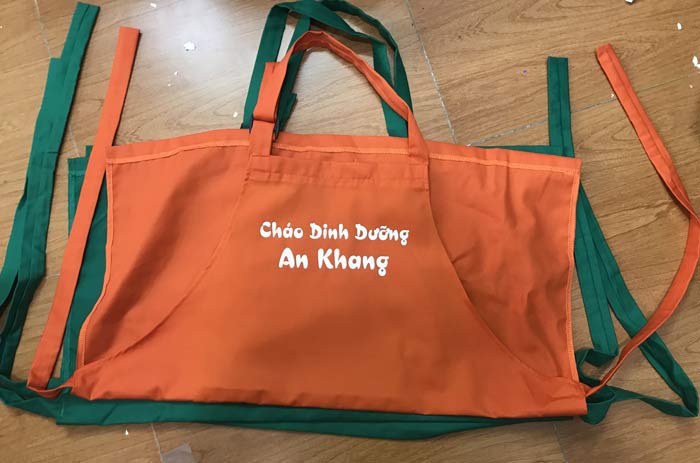 May tạp dề Quán cháo dinh dưỡng An Khang | May tap de dong phuc